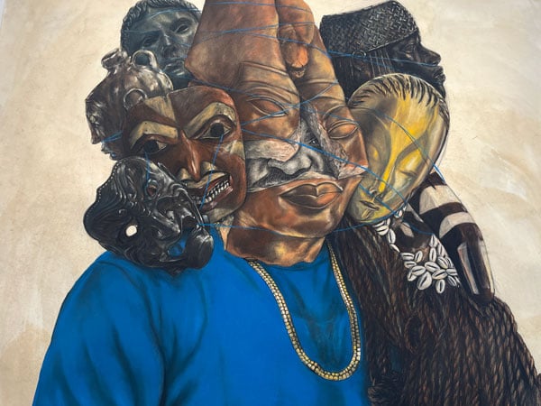 A detail of a painting shows a human figure with a mask-like face surrounded by other masks