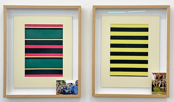 Two side by side paintings made up of colorful stripes feature photographs tucked into the righthand corner.