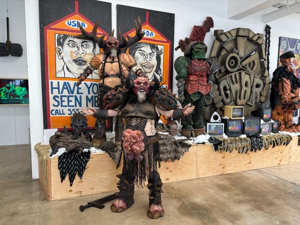 A figure displays one of the demonic looking costumes, completely with uncannily pink udders, worn by the shock rockers of GWAR.