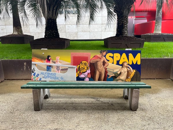 A bench at LACMA painted with a collage-like design by Alfonso Gonzalez Jr. incorporates leaves inspired by Matisse, a SPAM logo inspired by Ed Ruscha, and an image of artist Patssi Valdez from her years with Asco.