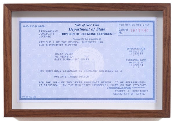 A print by Julia Weist reproduces her New York State license to conduct private investigations.