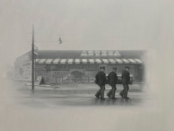 A painting by Vincent Valdez rendered in black and white shows six men in military dress carrying a coffin past a Mexican market called "Azteca"
