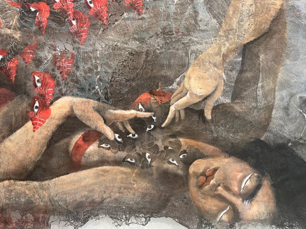 A detail of a painting by Hayv Kahraman shows a detail of a female figure laying on her back. Her eyes are closed and she appear to attempt to contain floating eyes that have over her chest.