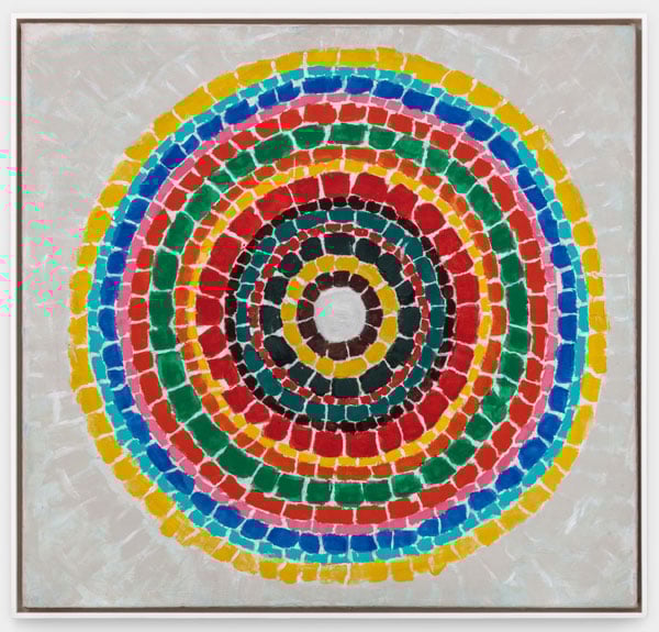 An abstract painting with a square shape by Alma Thomas features a series of concentric circles made up of bright blobs of color.
