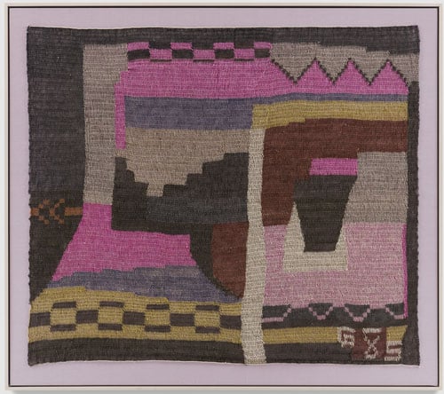 A loosely stitched weaving shows geometric patterns — checks, zig zags, and various asymmetrical forms, rendered in colors like pink, yellow and brown.