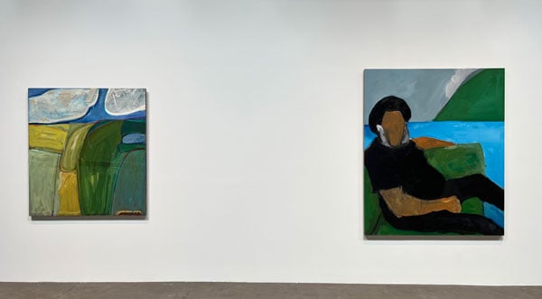 Two paintings hang on a gallery one: the first shows an abstract landscape rendered in greens and yellows; in the second, a Black man with a featureless face sits on a green sofa.