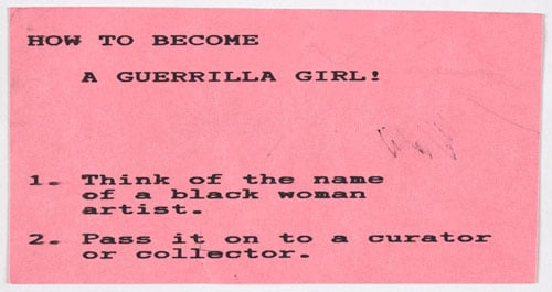 A pink index card reads: "How to become a Guerrilla Girl: 1. Think of the name of a Black woman artist. 2. Pass it on to a curator or collector."