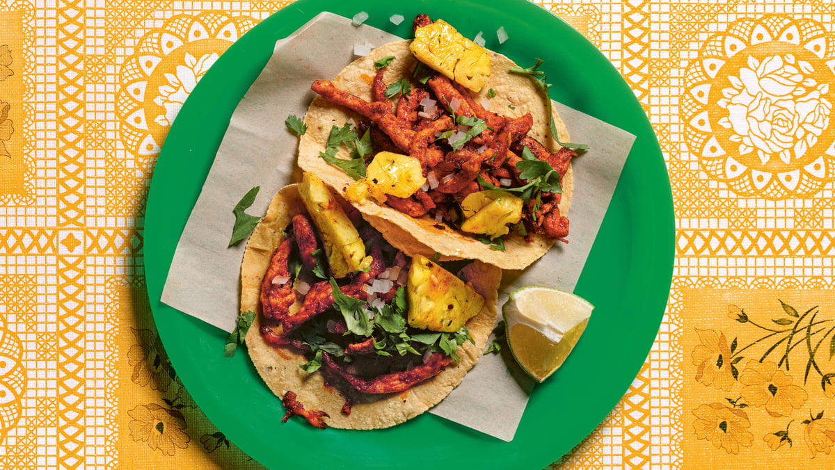 Al pastor taco filled with pork and pineapple. Photo by Araceli Pax