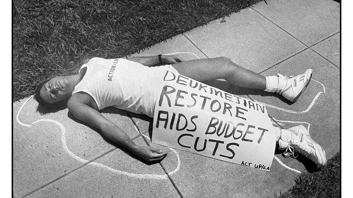 A member of ACT UP LA participates in a “die-in” protest in Long Beach. Photo by Chuck Stallard