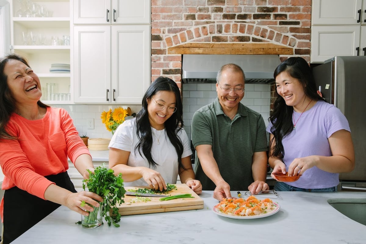 (From left to right) Judy, Kaitlin, Bill, and Sarah Leung created a blog, The Woks of Life, nearly a decade ago which has become the top online resource for Chinese cooking in English. Photo by Christine Han.