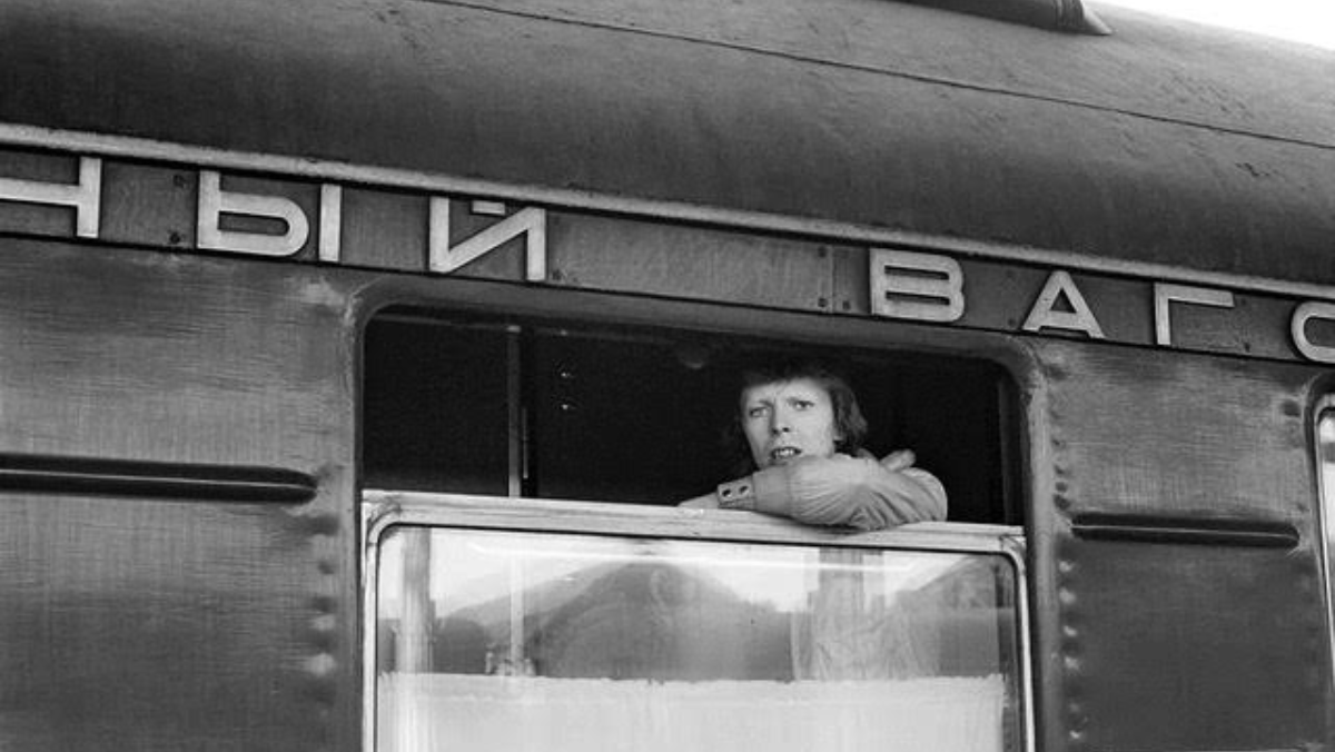 David Bowie looking out of the Trans-Siberian Express, 1973, courtesy Geoff MacCormack.jpg