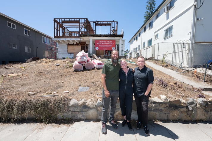 Jacques Laramee, Gwen Sukeena, Morgan Sykes Jaybush in front of the St. George St house being removed. Photo by Gary Leonard