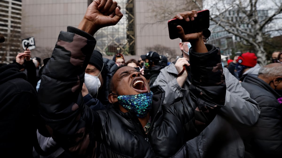 A person reacts after the verdict in the trial of former Minneapolis police officer Derek Chauvin, in the death of George Floyd, in front of Hennepin County Government Center, in Minneapolis, Minnesota, U.S., April 20, 2021. Photo by Carlos Barria/Reuters.