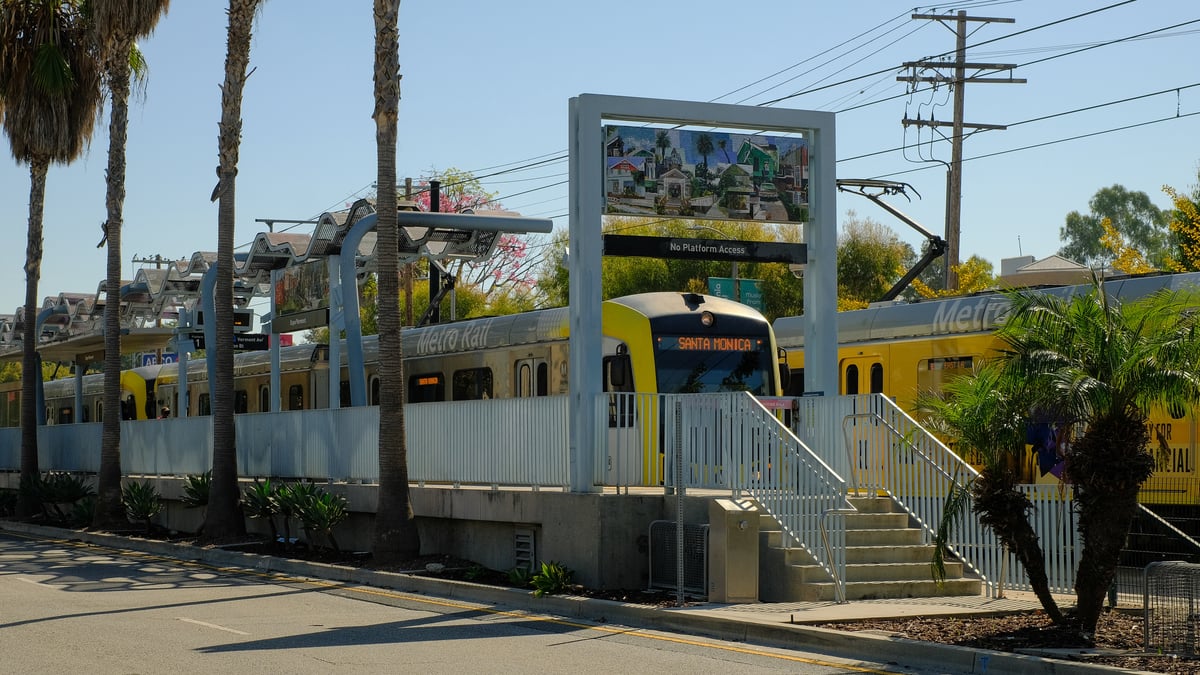 Metro rail trains are seen at Exposition Blvd. and Vermont Ave., Los Angeles, CA. Photo by Amy Ta.
