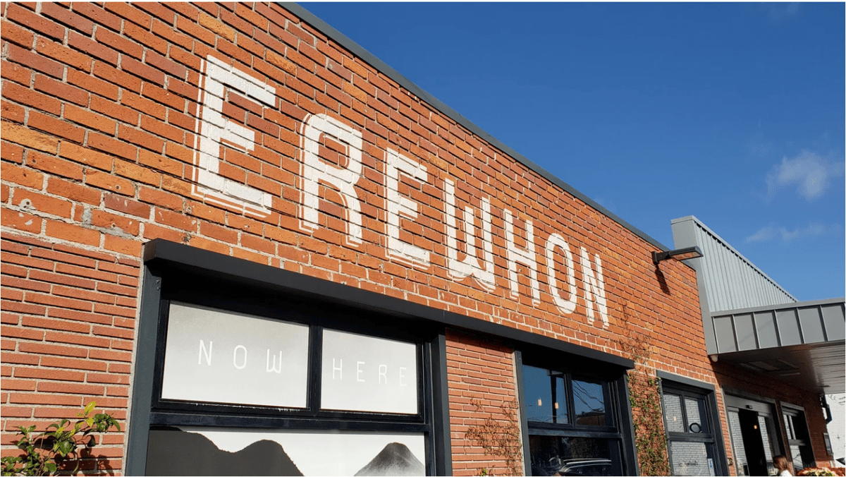 A store front sign for the upscale organic grocery store chain known as Erewhon, in Venice Beach, CA. Photo courtesy of Shutterstock.