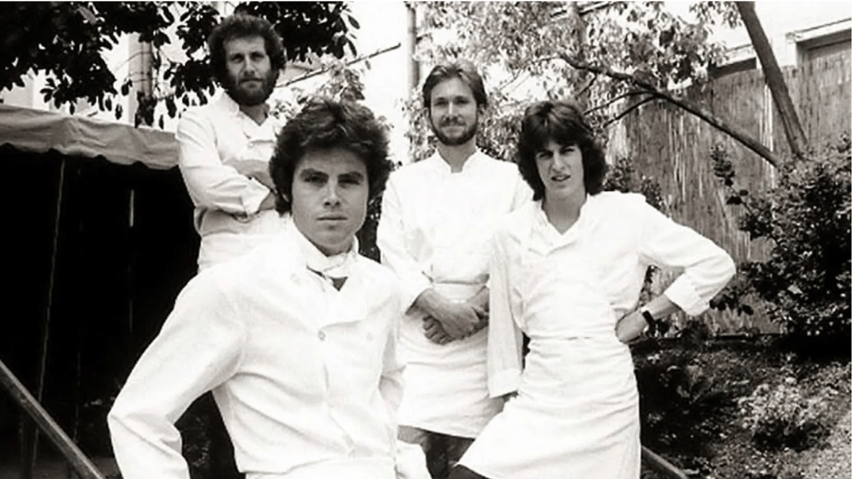Michael McCarty (in the front) poses with a few members of the original crew at Michael's (left to right): Jonathan Waxman, Mark Peel, and Ken Frank. Photo courtesy of Michael's.