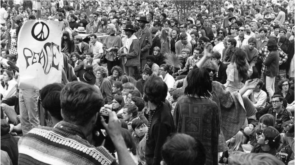 A group of people gathered in Griffith Park for a "Love-In." Writer Jonathan Kauffman attributes the longevity of healthy eating to the counterculture diet of the 1970s. Photo by William Reagh, courtesy of Digital Collections of the Los Angeles Public Library