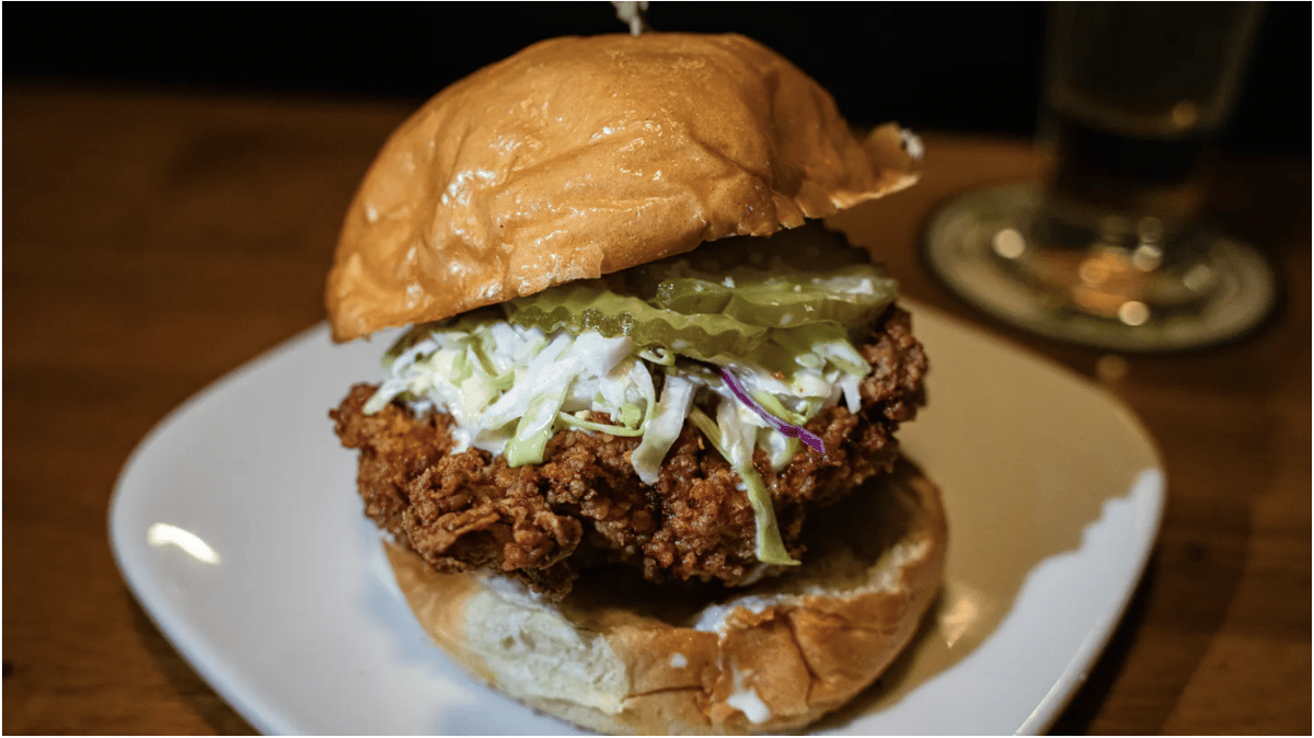 Wash down a Nashville hot chicken sandwich with your choice of 30 California beers at We're Pouring. Photo by Memo Torres.