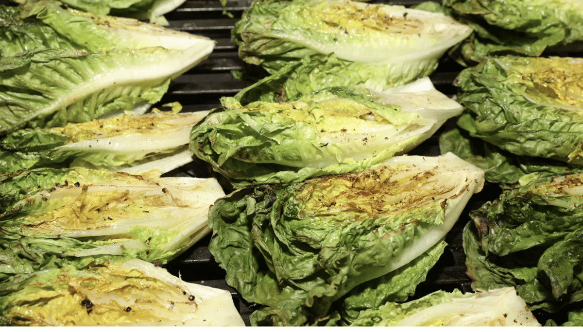 Grilling romaine lettuce adds a twist to the classic Caesar salad. Credit: Photo via Shutterstock