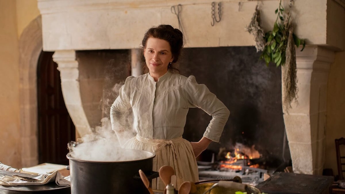 Juliette Binoche plays Eugénie, an artist in the kitchen, in Tran Anh Hung's "The Taste of Things." Courtesy of Carole Bethuel. An IFC Films Release.