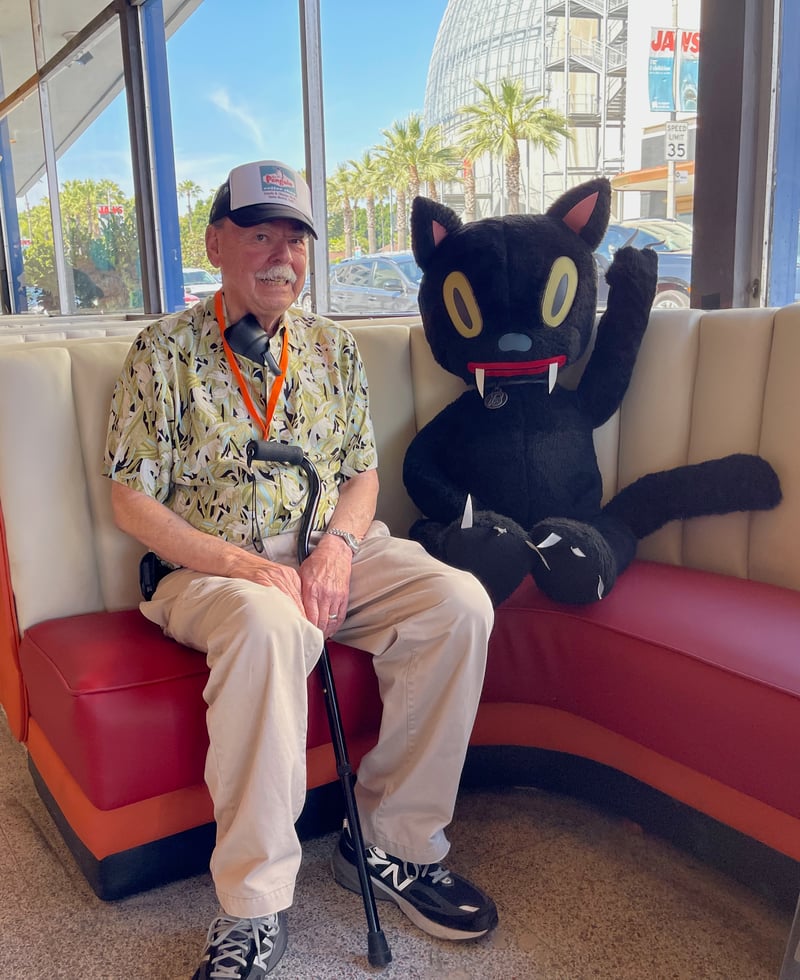 Victor Newlove sits with Gary Basemanss signature Black Cat, IMG_8206