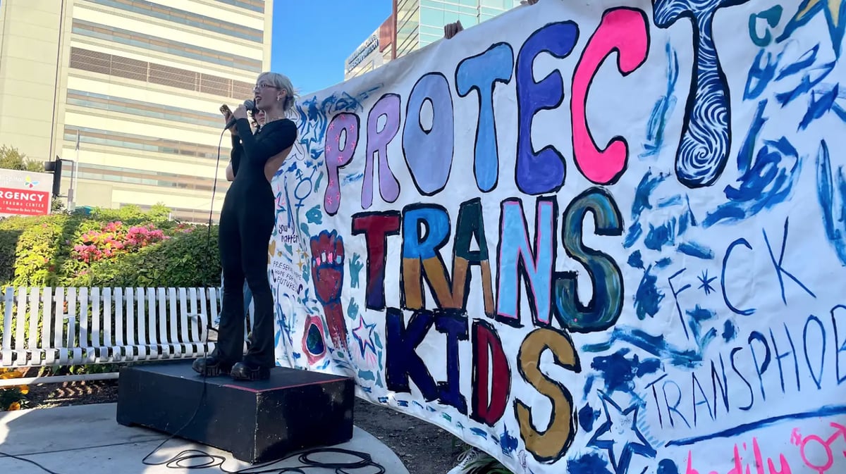 Maria Do of the Los Angeles LGBT Center speaks at a July 3 rally to protest the closure of the Center for Transyouth at Children’s Hospital Los Angeles. Photo by Megan Jamerson/KCRW.