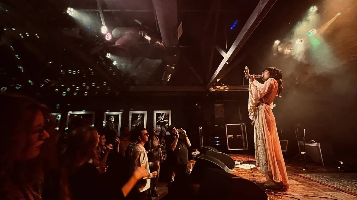 Singer Love Femme of the band Amo Amo performs on stage. Photo credit: Lauren Purves.