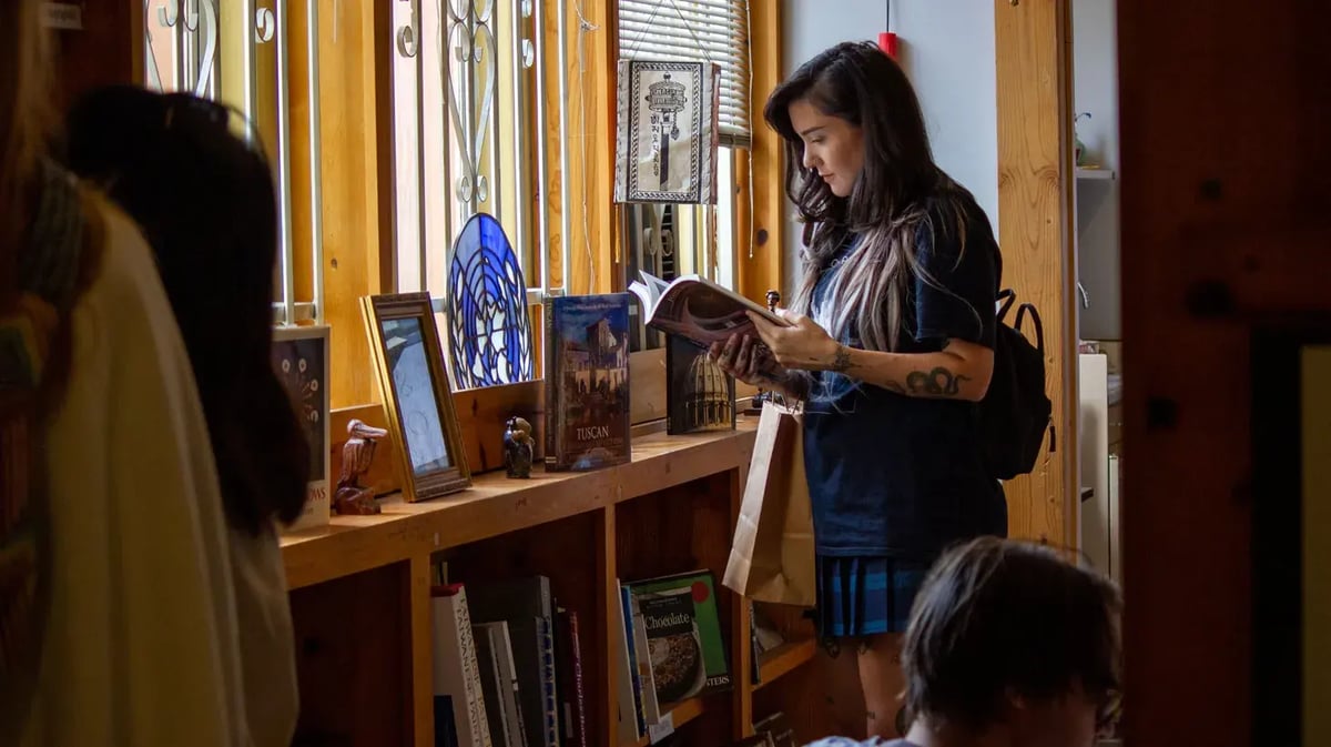 Visitors to the Philosophical Research Society browse the bookstore. Credit: Liz Vasquez.