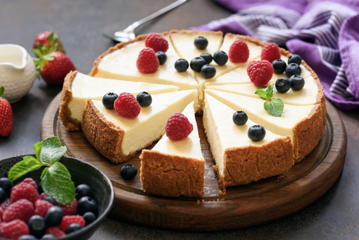 The recipe for this classic New York dessert plays a central role in Mark Kurlansky's novel, "Cheesecake." Photo via Shutterstock.